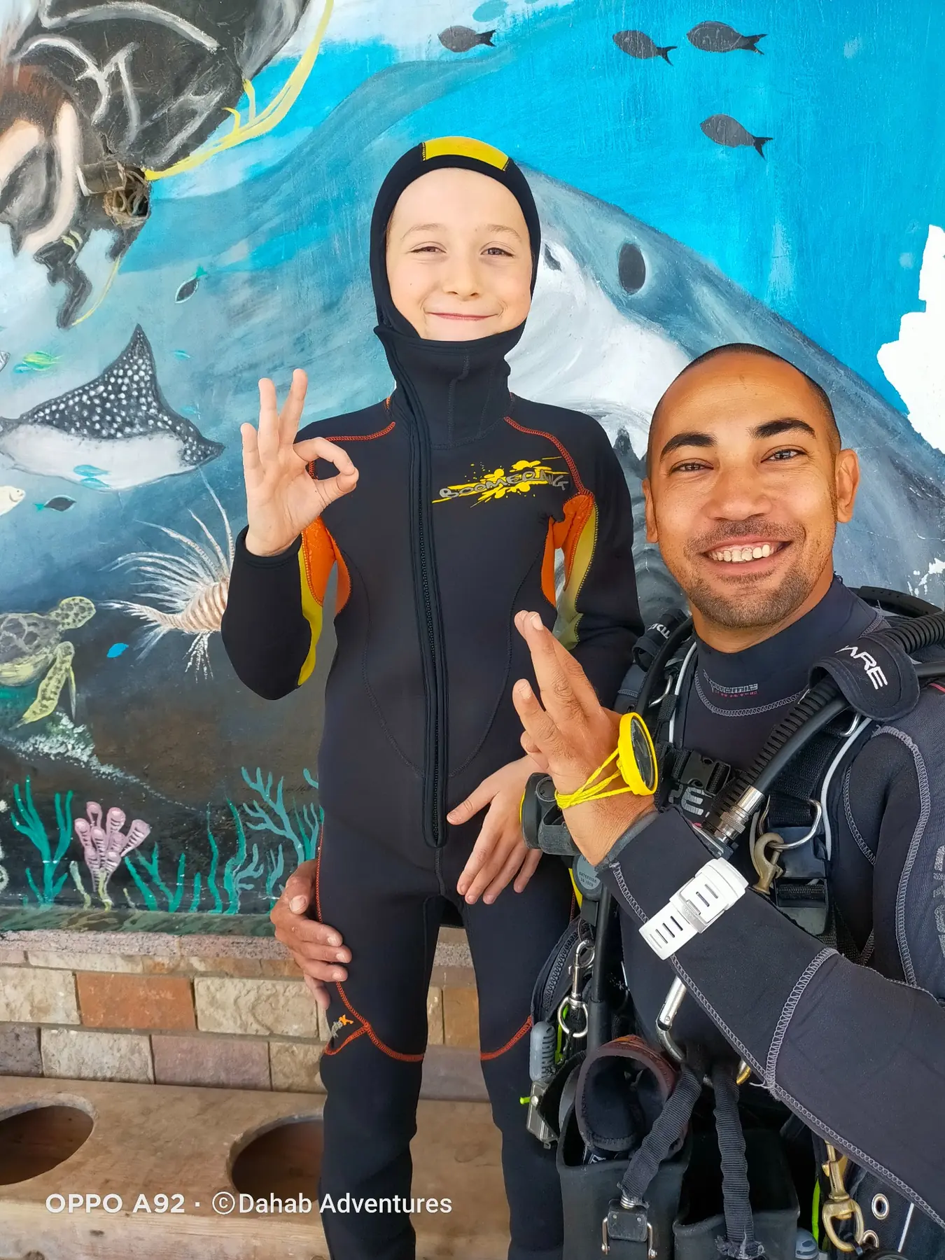 Small diver in the ocean