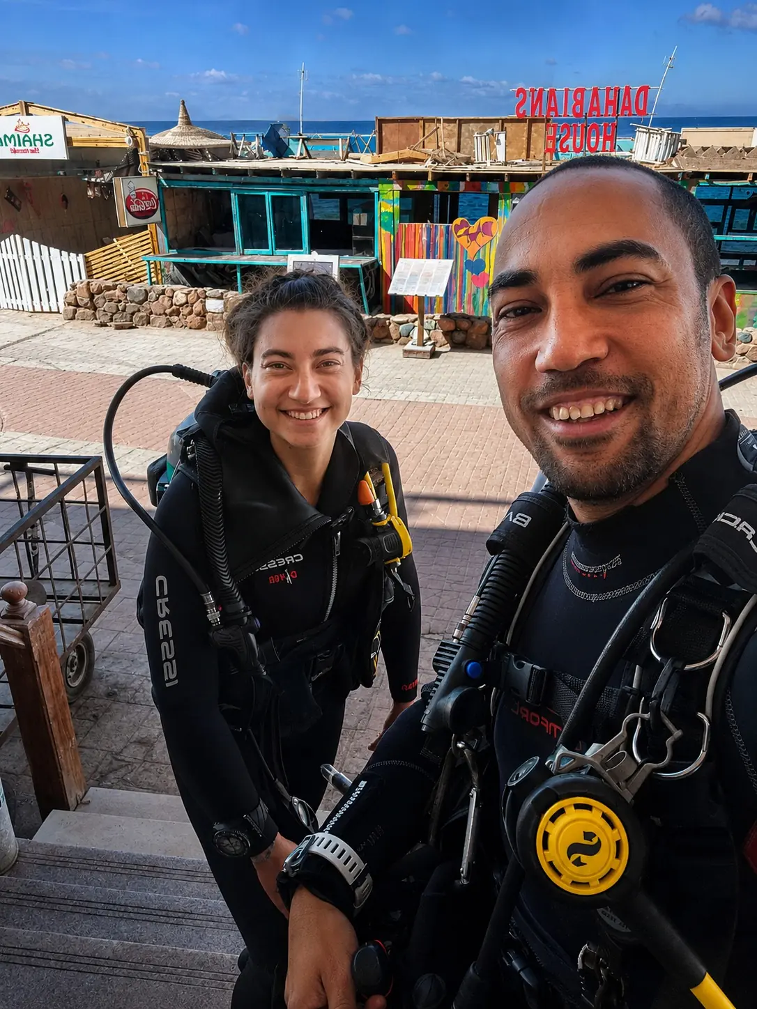 Smiling diver with instructor